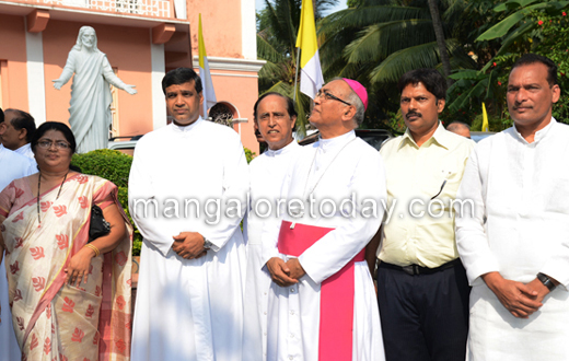 vehicle rally carrying the  statue of Pope John Paul II